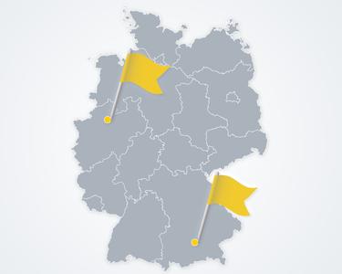 Deutschlandkarte mit zwei gelben Flaggen im Westen und Süden